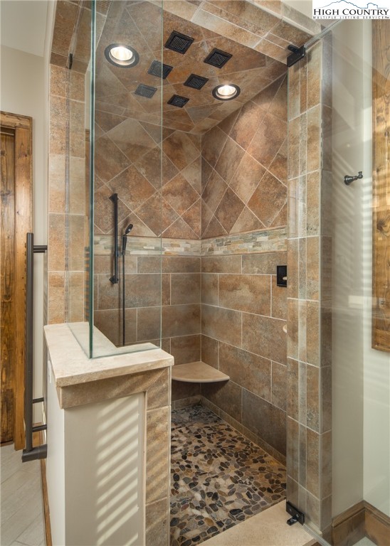 331 Goldenrod Road Boone, NC 28607 - Photo 19 of 50 a bathroom with a sink toilet and shower