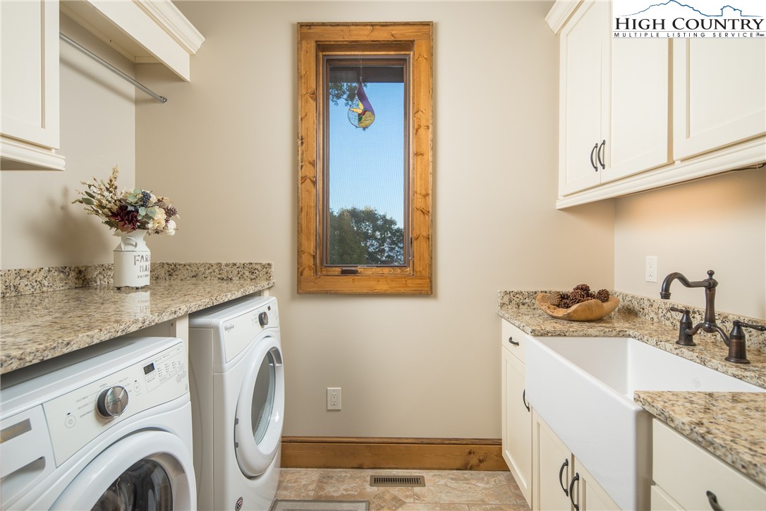 331 Goldenrod Road Boone, NC 28607 - Photo 20 of 50 a utility room with sink washer and dryer