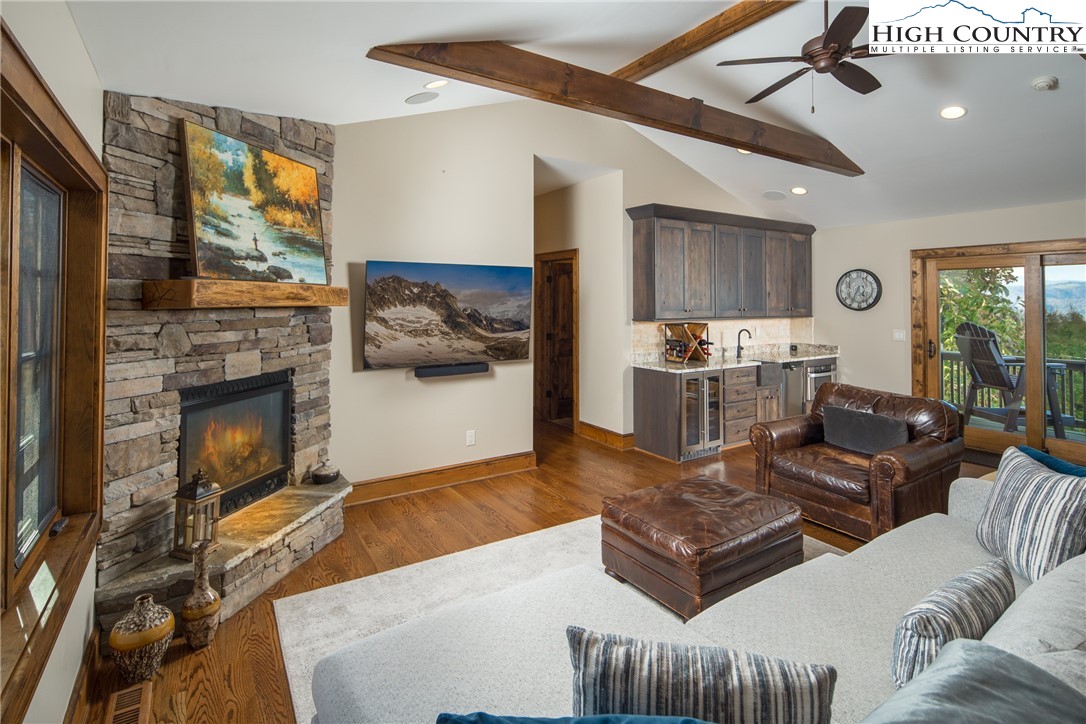 331 Goldenrod Road Boone, NC 28607 - Photo 23 of 50 a living room with furniture and a fireplace