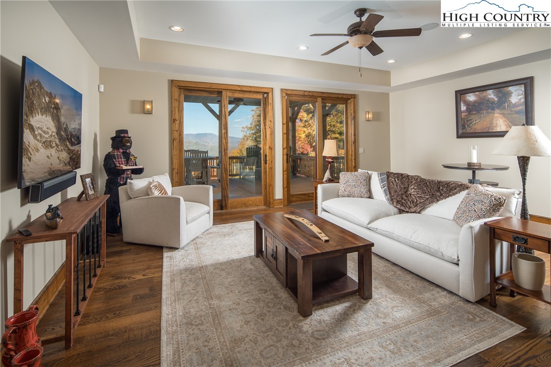 331 Goldenrod Road Boone, NC 28607 - Photo 28 of 50 a living room with furniture and a flat screen tv
