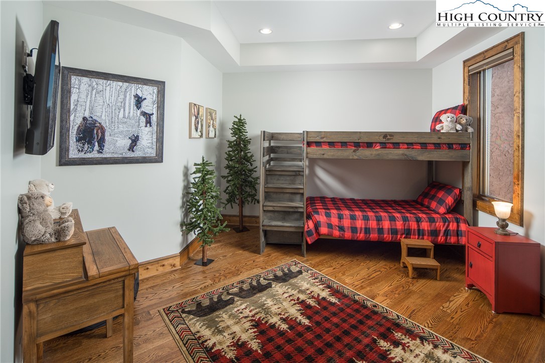 331 Goldenrod Road Boone, NC 28607 - Photo 34 of 50 a bedroom with a bed and a couch