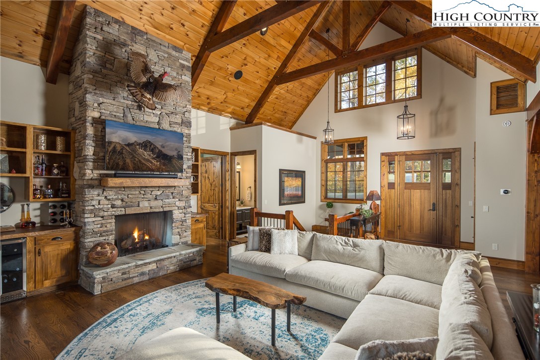 331 Goldenrod Road Boone, NC 28607 - Photo 4 of 50 a living room with furniture and a fireplace