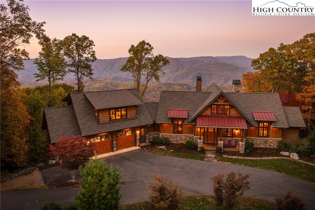 331 Goldenrod Road Boone, NC 28607 - Photo 45 of 50 a view of a big house with a big yard and large trees
