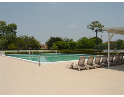 22295 Misty Woods Way, Unit 62B Boca Raton, FL 33428 - Photo 23 of 25 a view of lake with a big yard