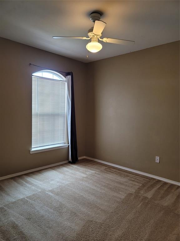 204 Meadow View Lane Anna, TX 75409 - Photo 12 of 23 an empty room with a window