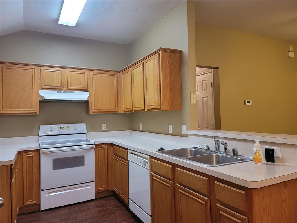 204 Meadow View Lane Anna, TX 75409 - Photo 15 of 23 a kitchen with a sink stove and cabinets