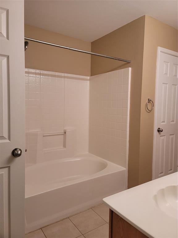 204 Meadow View Lane Anna, TX 75409 - Photo 18 of 23 a bathroom with a shower and a bath tub
