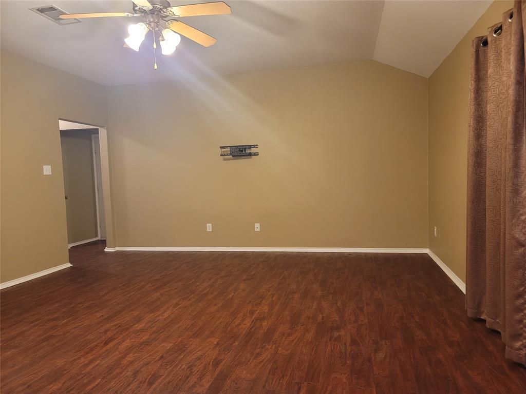 204 Meadow View Lane Anna, TX 75409 - Photo 7 of 23 a view of an empty room with wooden floor