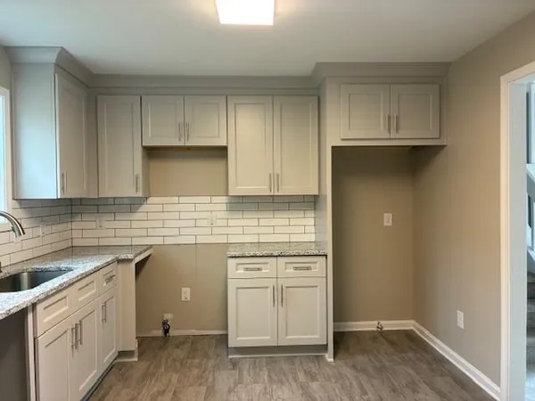 a view of a room with an empty space