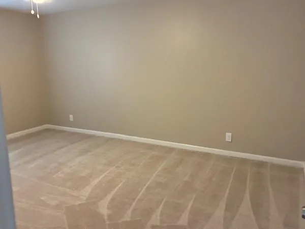 a view of a room with a door