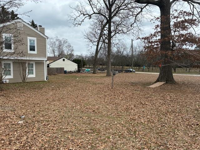 4108 Abbotts Bridge Road Duluth, GA 30097 - Photo 31 of 31 a view of a yard with a house