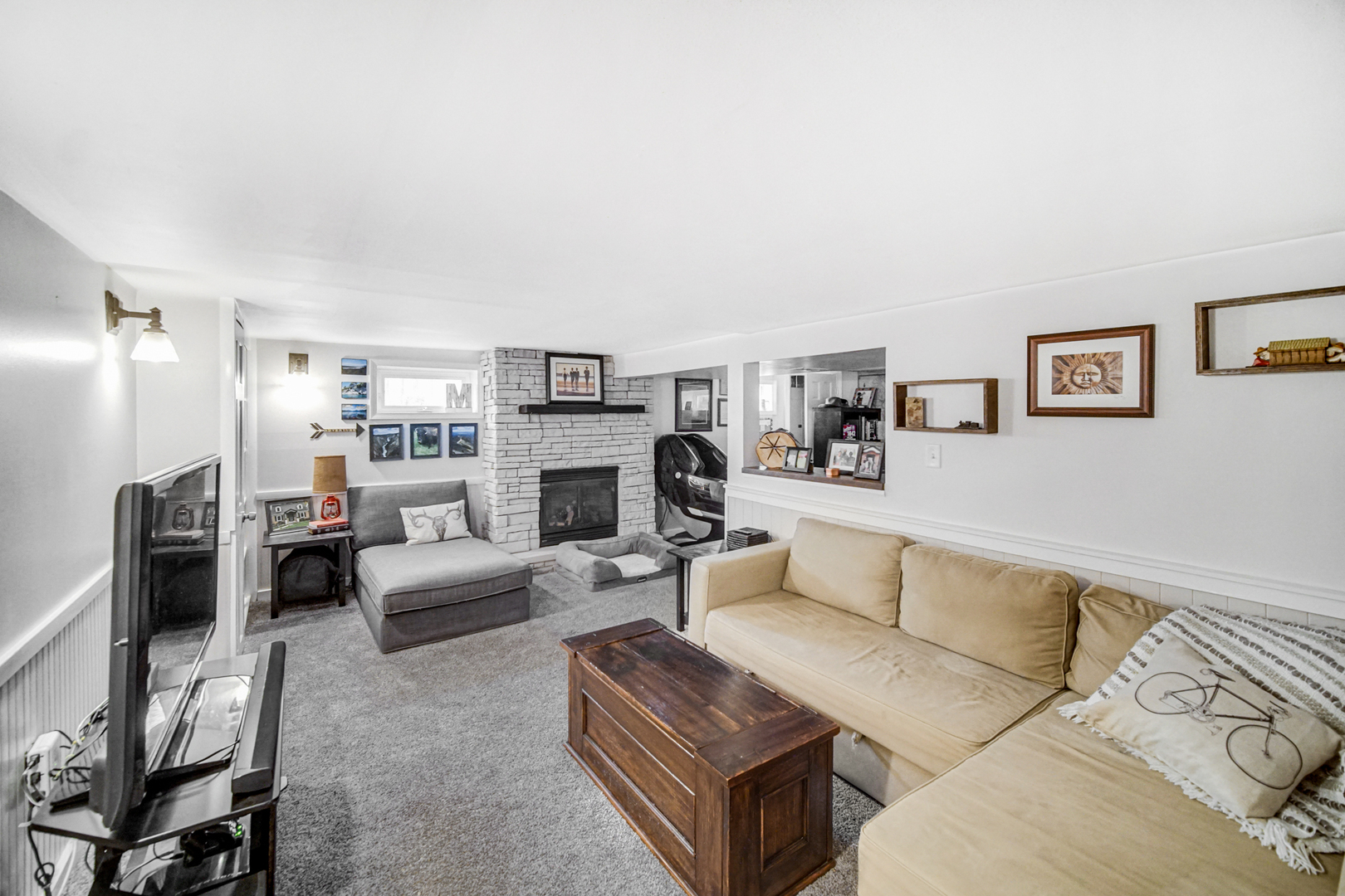 1308 Manchester Road Wheaton, IL 60187 - Photo 15 of 30 a living room with furniture and a fireplace