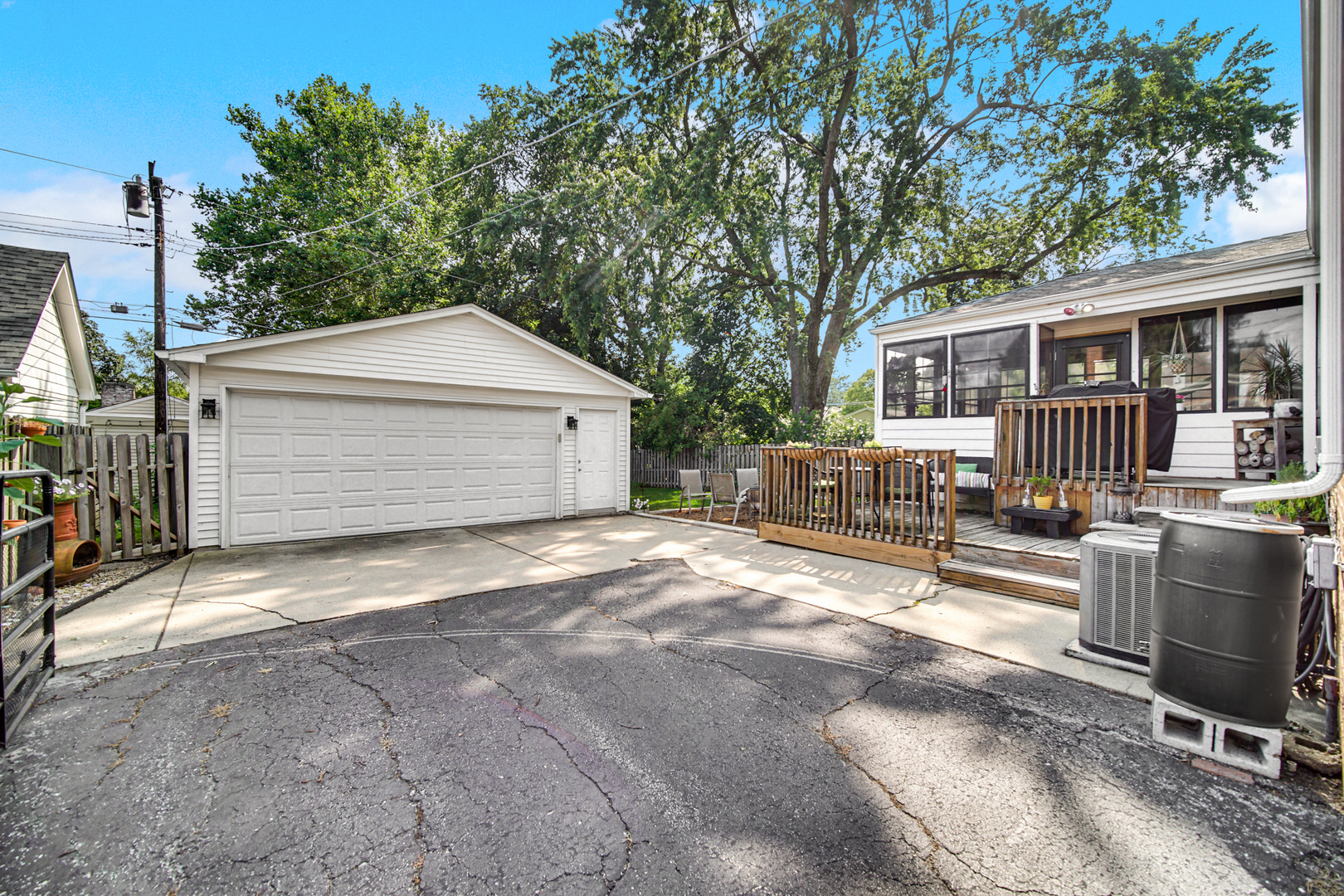 1308 Manchester Road Wheaton, IL 60187 - Photo 26 of 30 a front view of a house with a yard and garage
