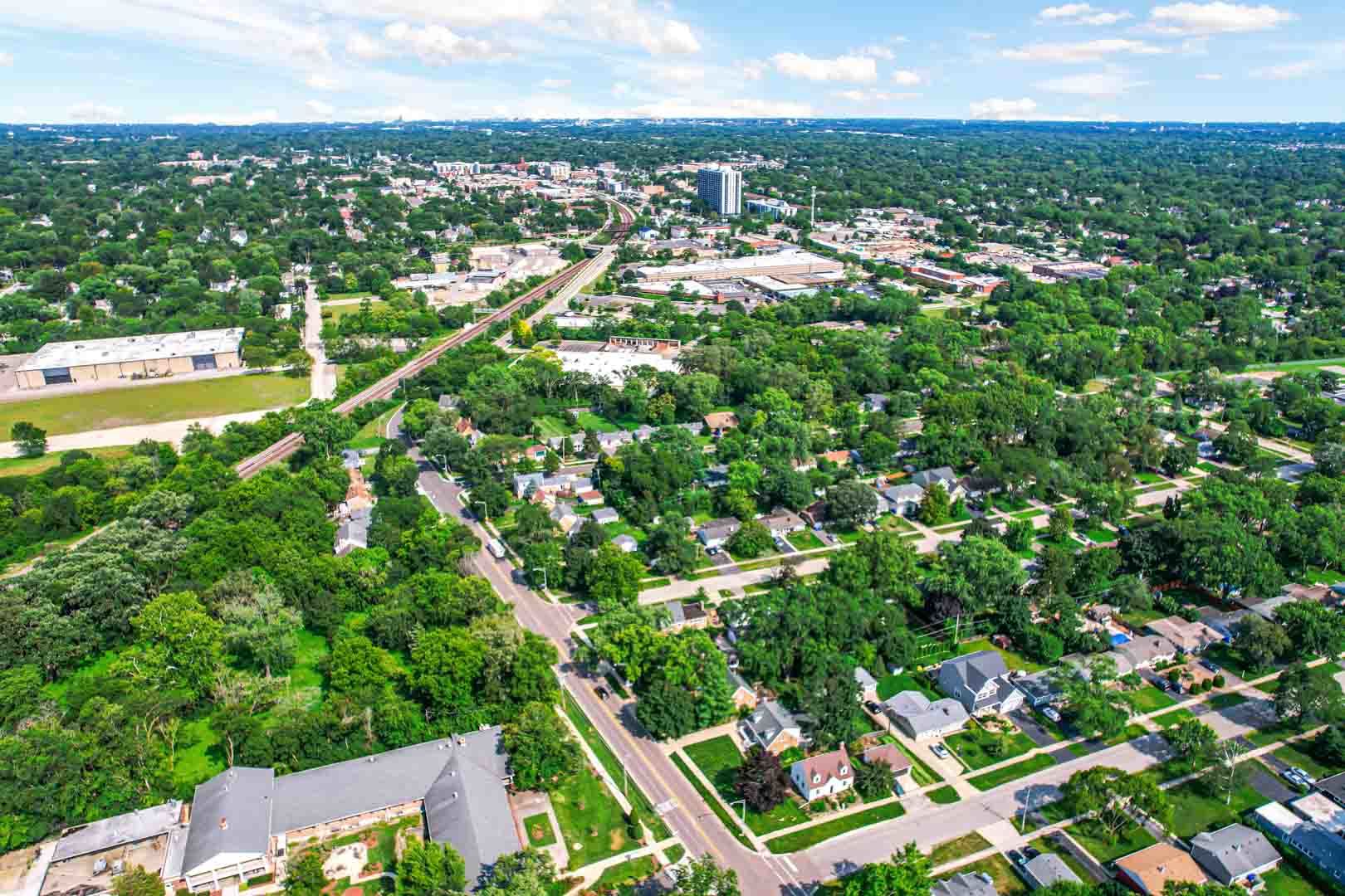 1308 Manchester Road Wheaton, IL 60187 - Photo 4 of 30 an aerial view of residential houses with outdoor space and trees