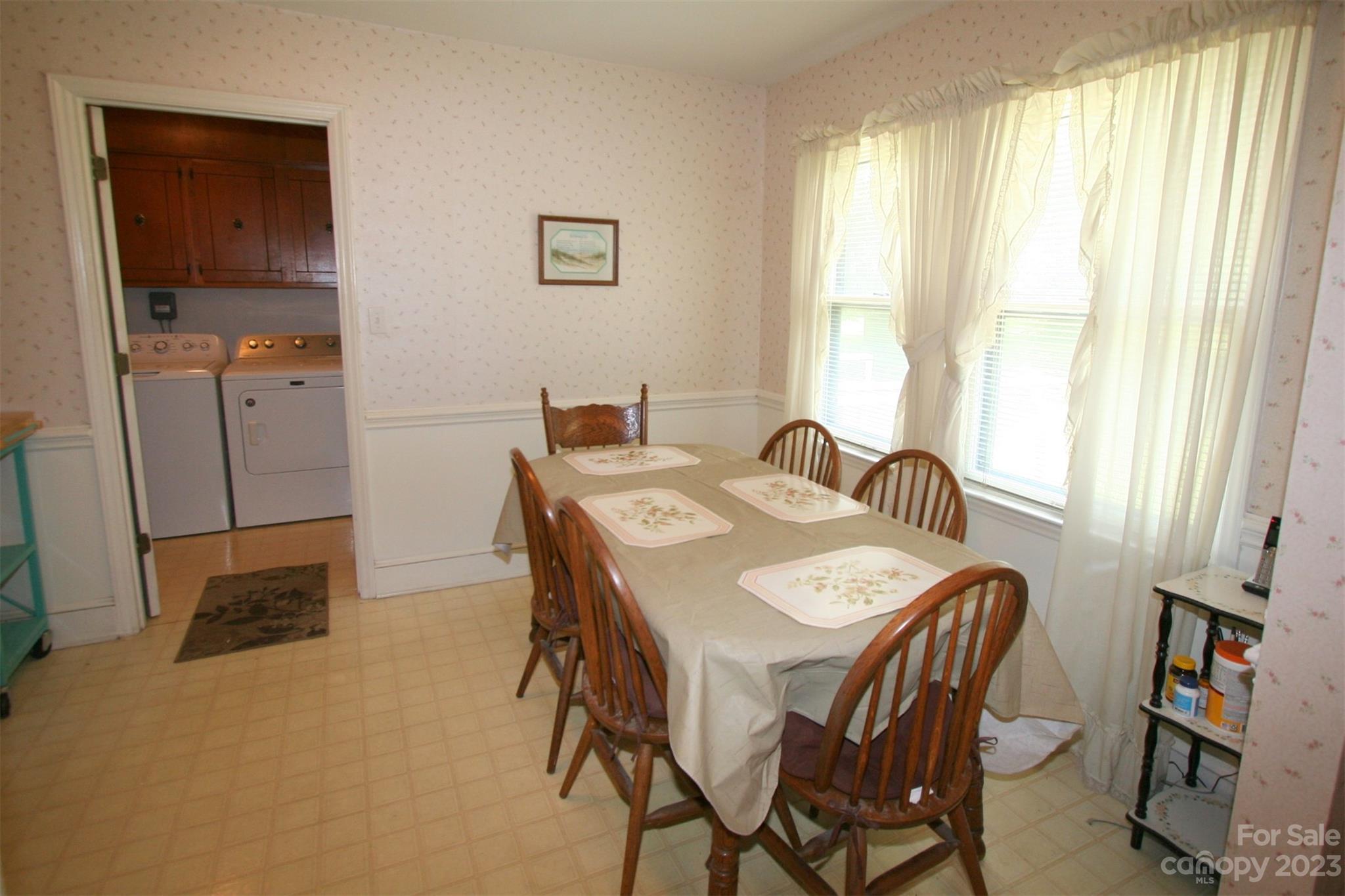 2813 Castlebrook Drive Monroe, NC 28112 - Photo 14 of 37 a view of a dining room with furniture and a window