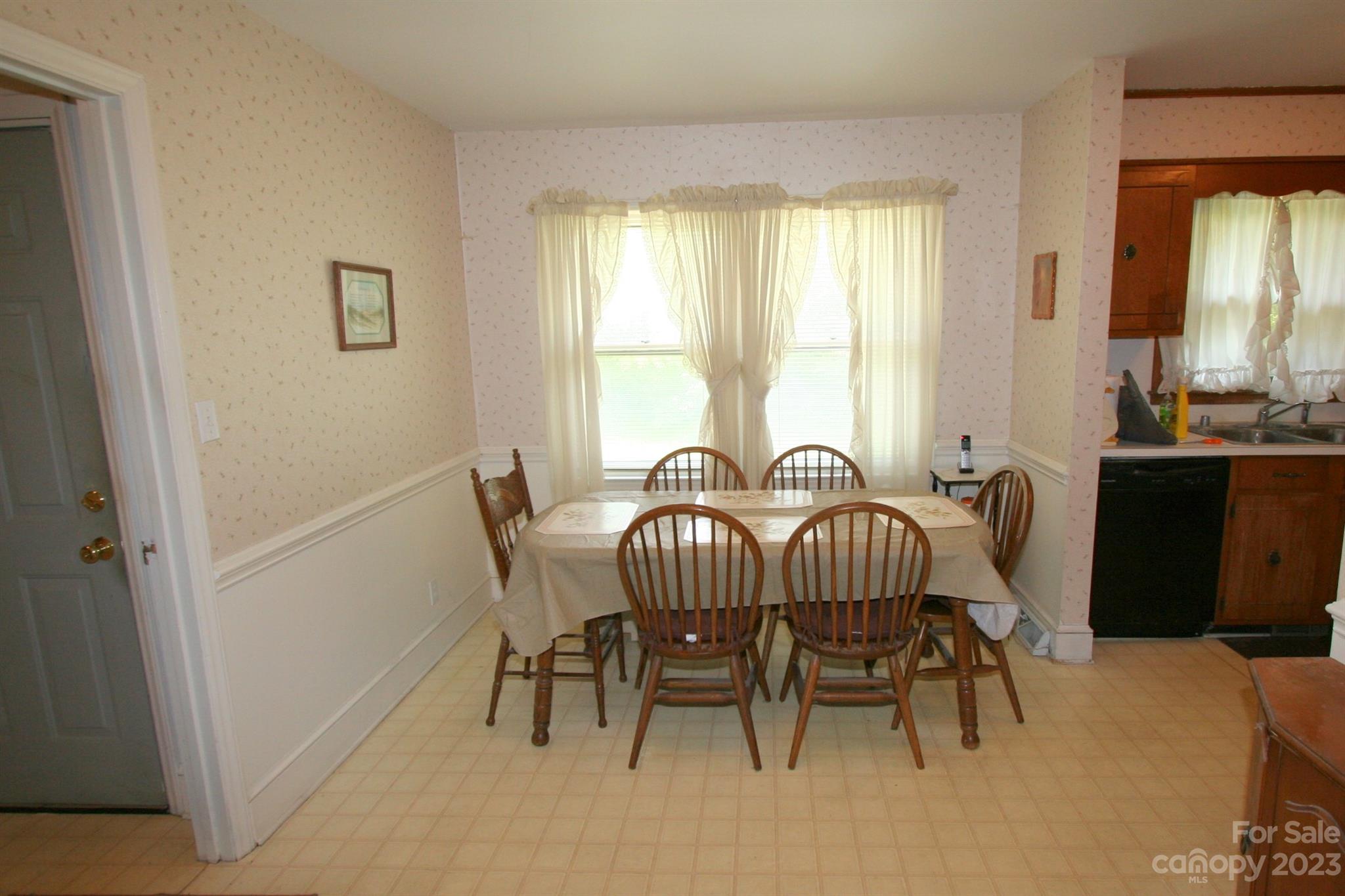 2813 Castlebrook Drive Monroe, NC 28112 - Photo 15 of 37 a view of a dining room with furniture window and outside view