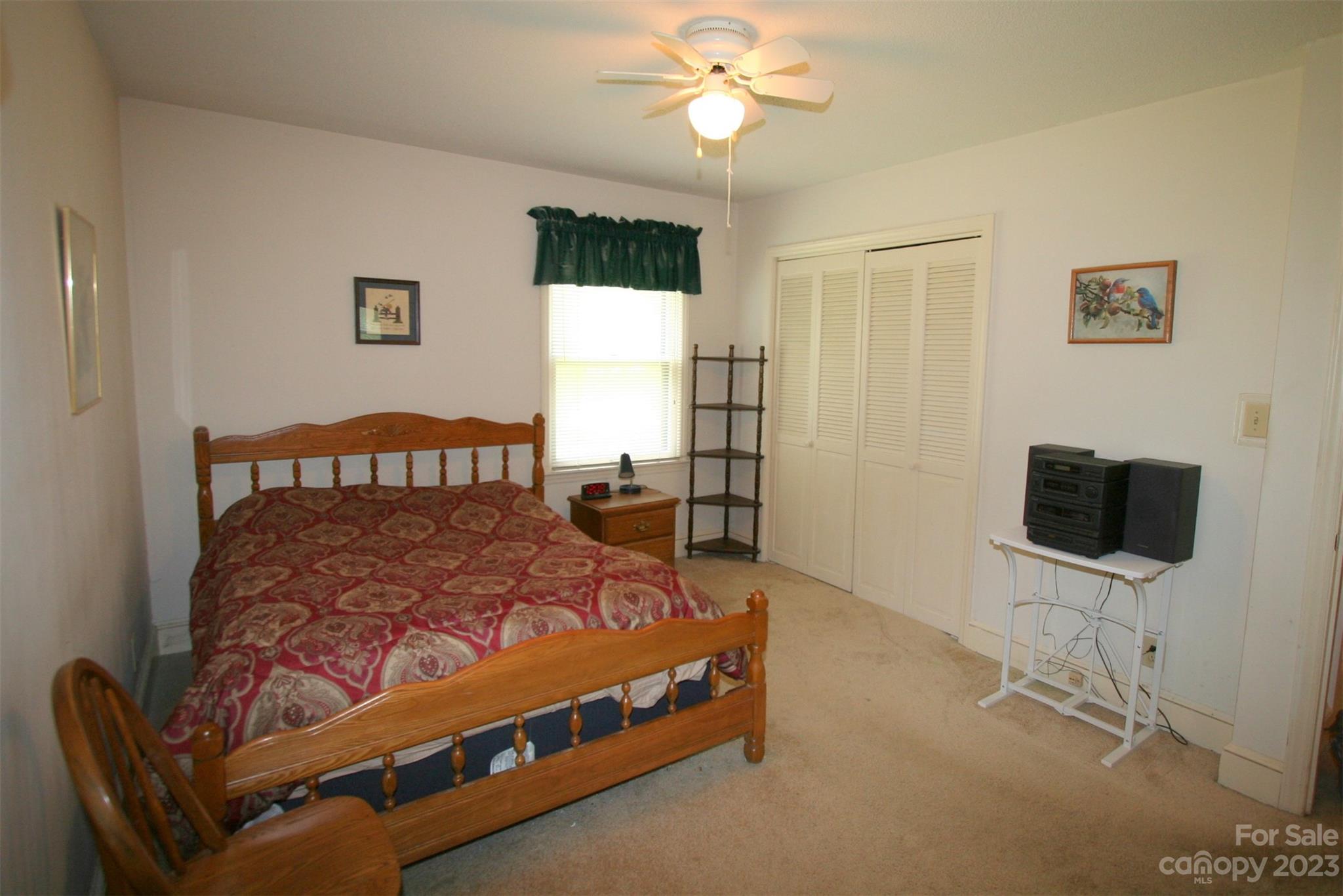 2813 Castlebrook Drive Monroe, NC 28112 - Photo 20 of 37 a bedroom with a bed and a flat screen tv