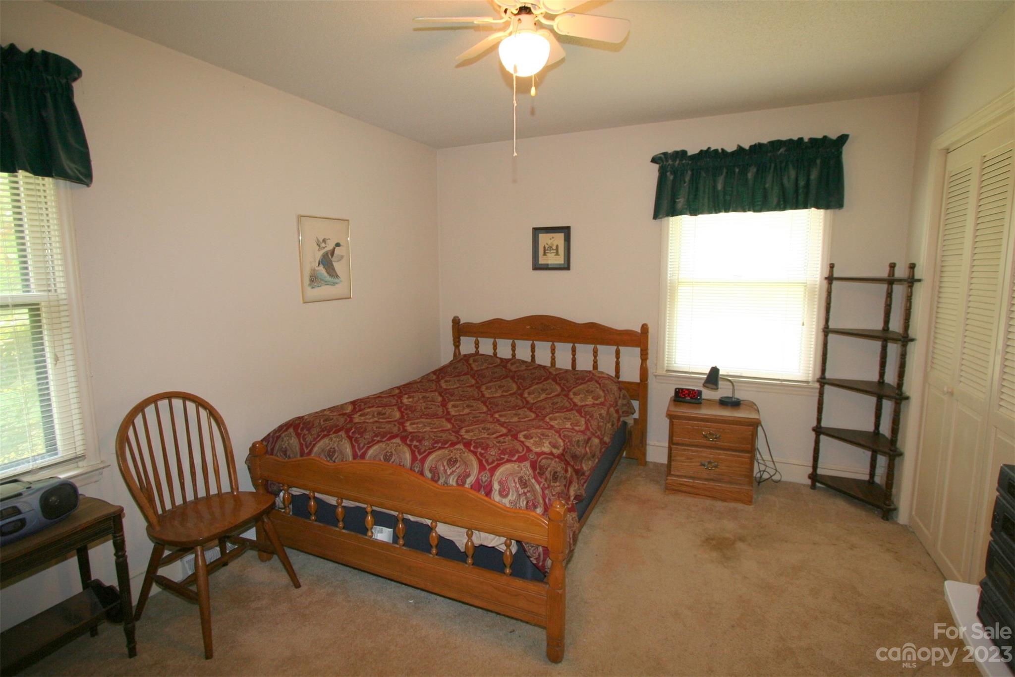 2813 Castlebrook Drive Monroe, NC 28112 - Photo 21 of 37 a bedroom with a bed and a window