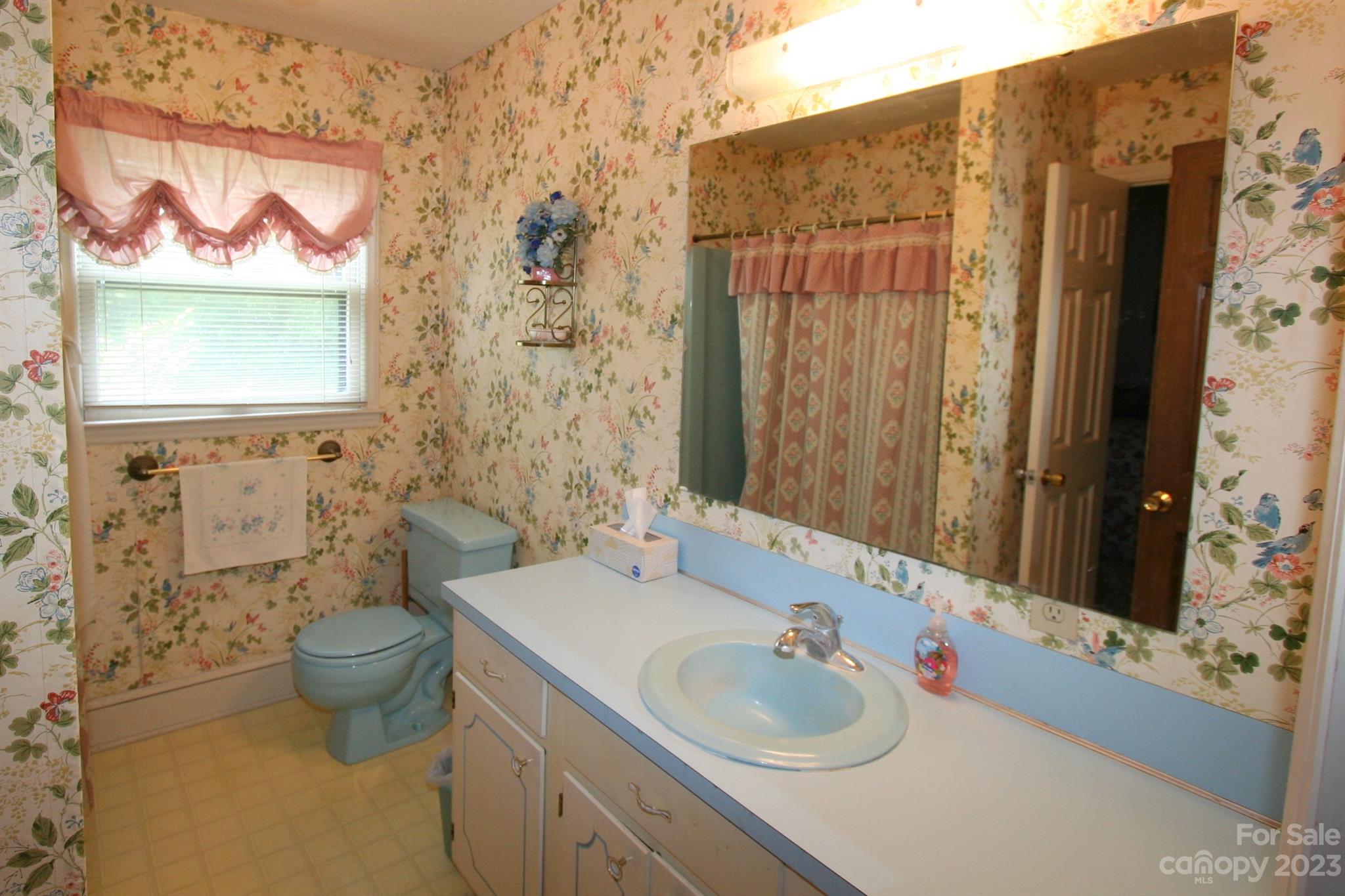 2813 Castlebrook Drive Monroe, NC 28112 - Photo 27 of 37 a bathroom with a sink and a mirror