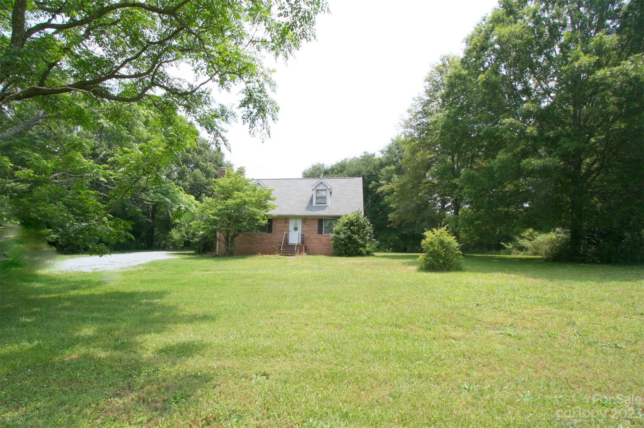 2813 Castlebrook Drive Monroe, NC 28112 - Photo 3 of 37 a house with a yard