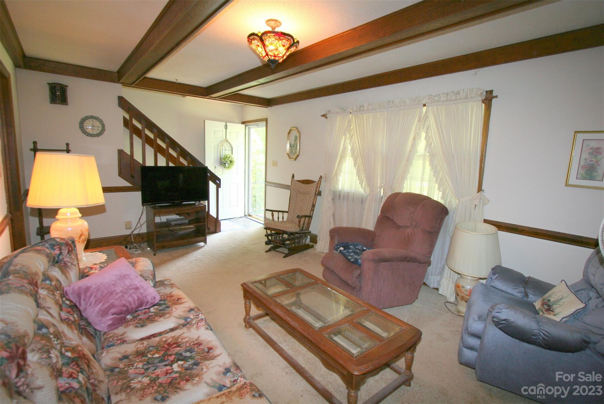 2813 Castlebrook Drive Monroe, NC 28112 - Photo 5 of 37 a living room with furniture and a fireplace
