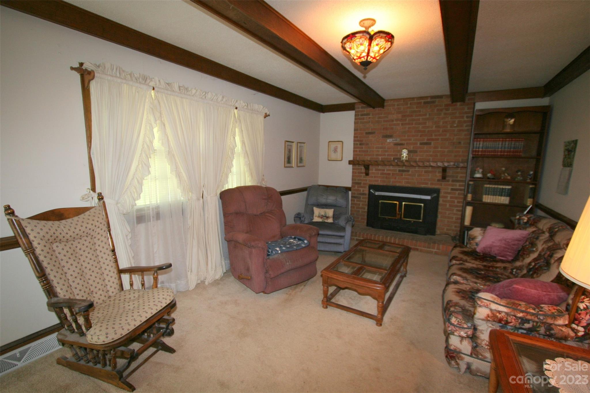 2813 Castlebrook Drive Monroe, NC 28112 - Photo 6 of 37 a living room with furniture and a fireplace