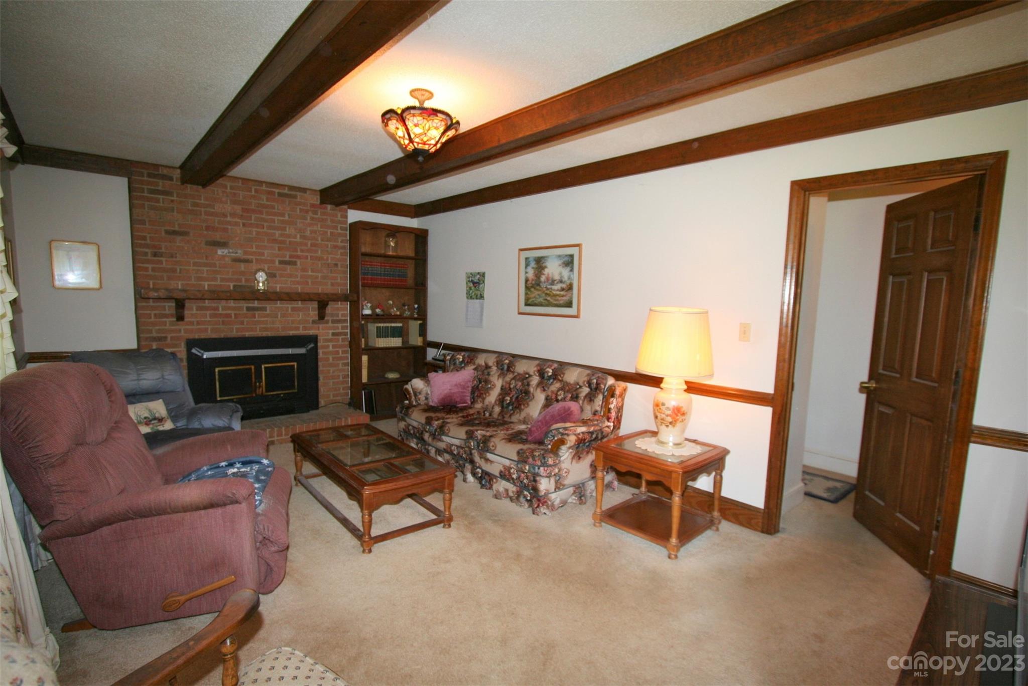 2813 Castlebrook Drive Monroe, NC 28112 - Photo 8 of 37 a living room with furniture and a fireplace
