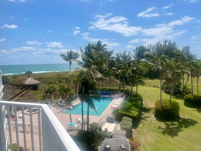 a view of a lake from a balcony