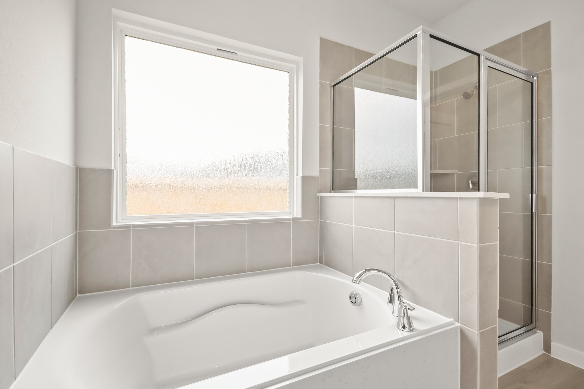 513 Wax Myrtle Way Hockley, TX 77447 - Photo 15 of 29 a bathroom with a bathtub and a shower