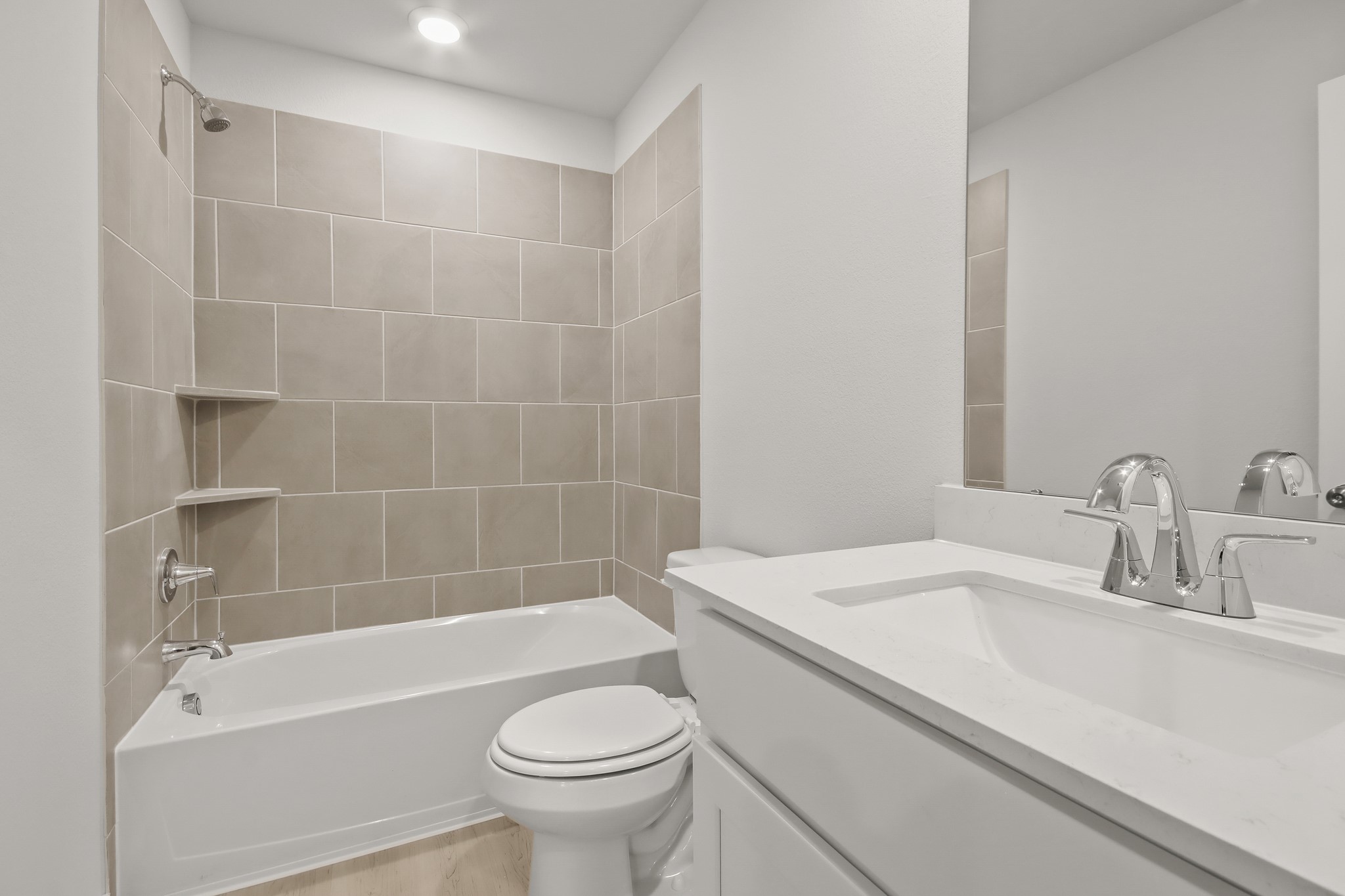 513 Wax Myrtle Way Hockley, TX 77447 - Photo 18 of 29 a bathroom with a sink a toilet and bathtub