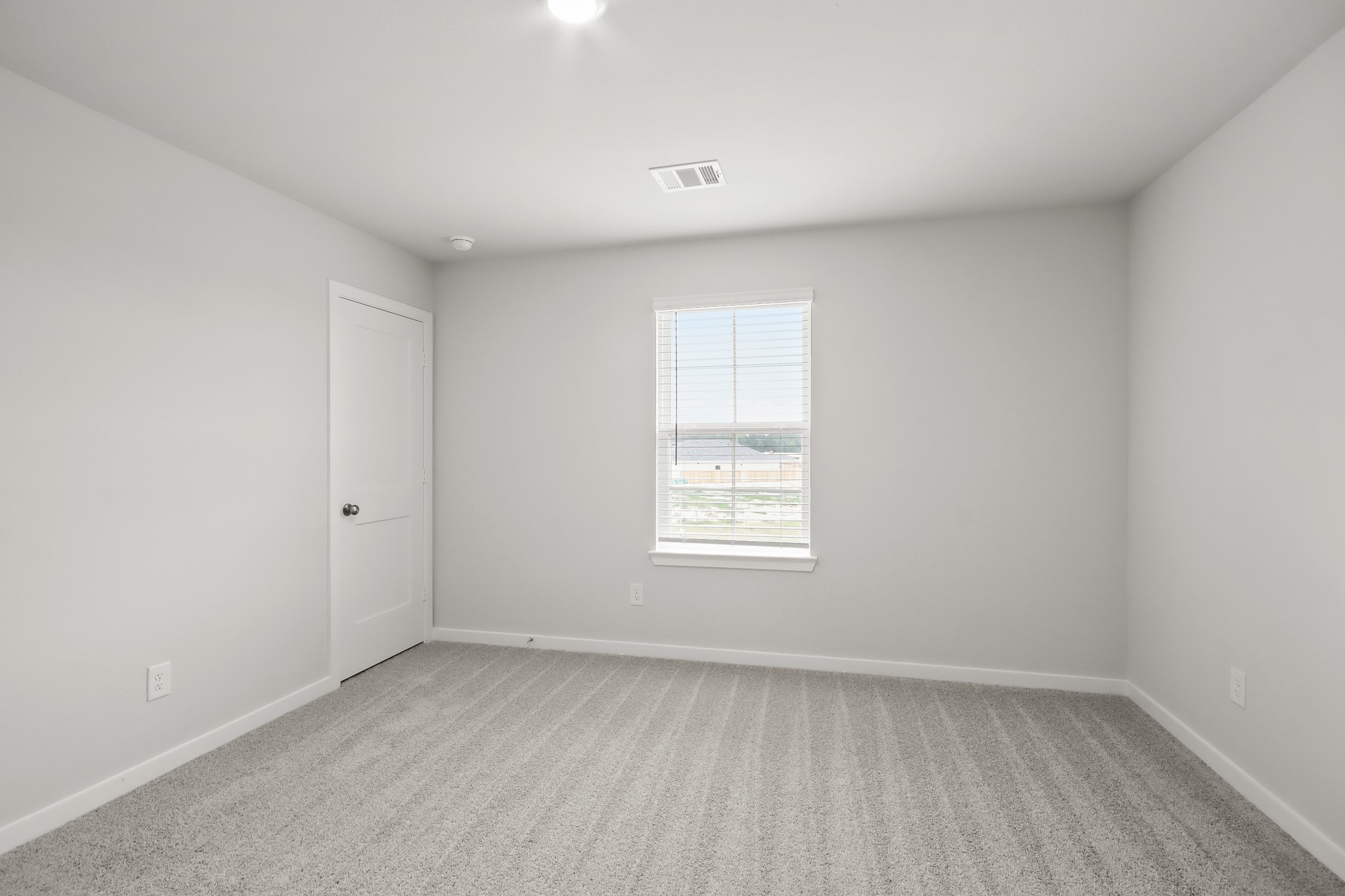 513 Wax Myrtle Way Hockley, TX 77447 - Photo 21 of 29 a view of an empty room with a window