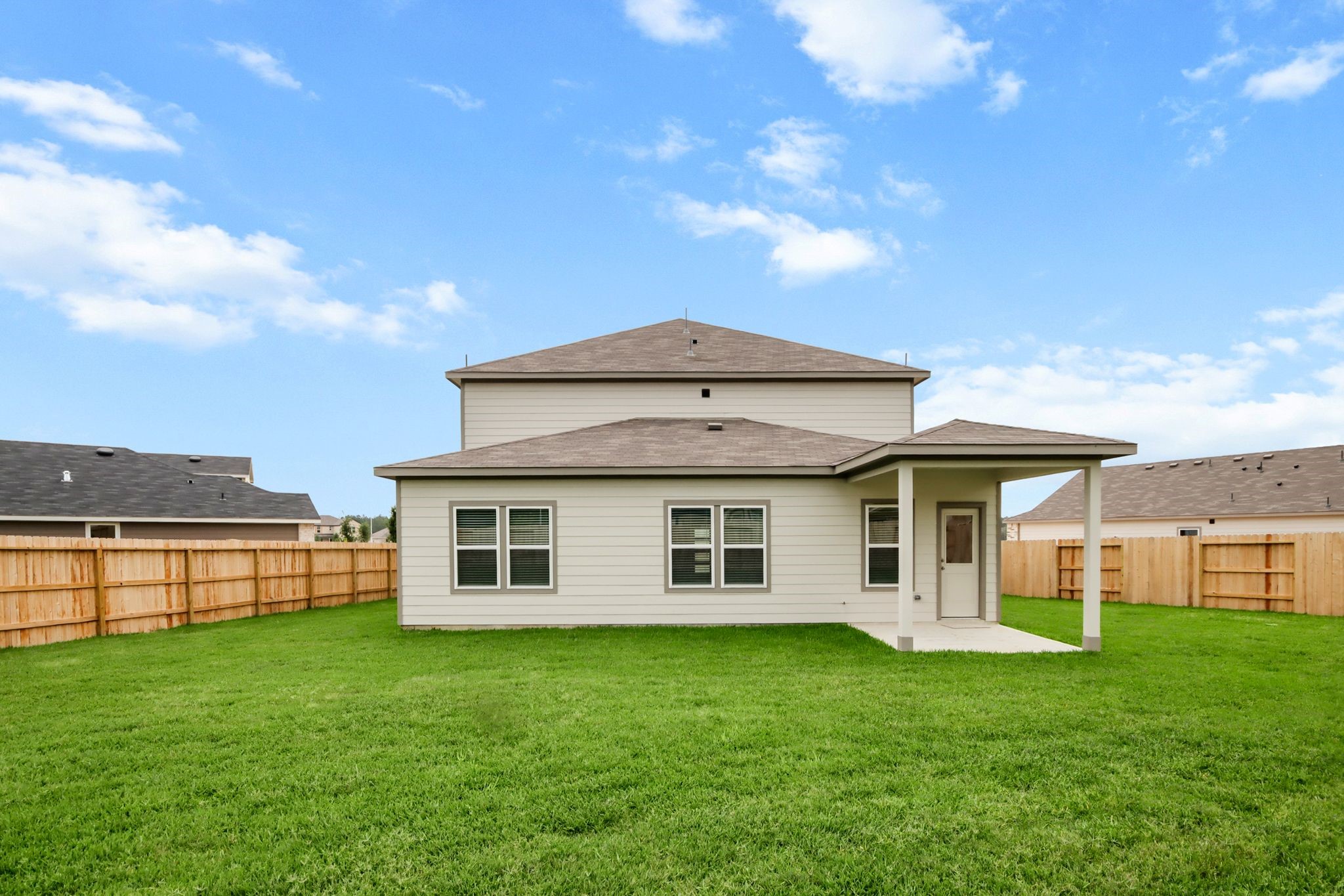 513 Wax Myrtle Way Hockley, TX 77447 - Photo 3 of 29 a view of a yard with a house in the background