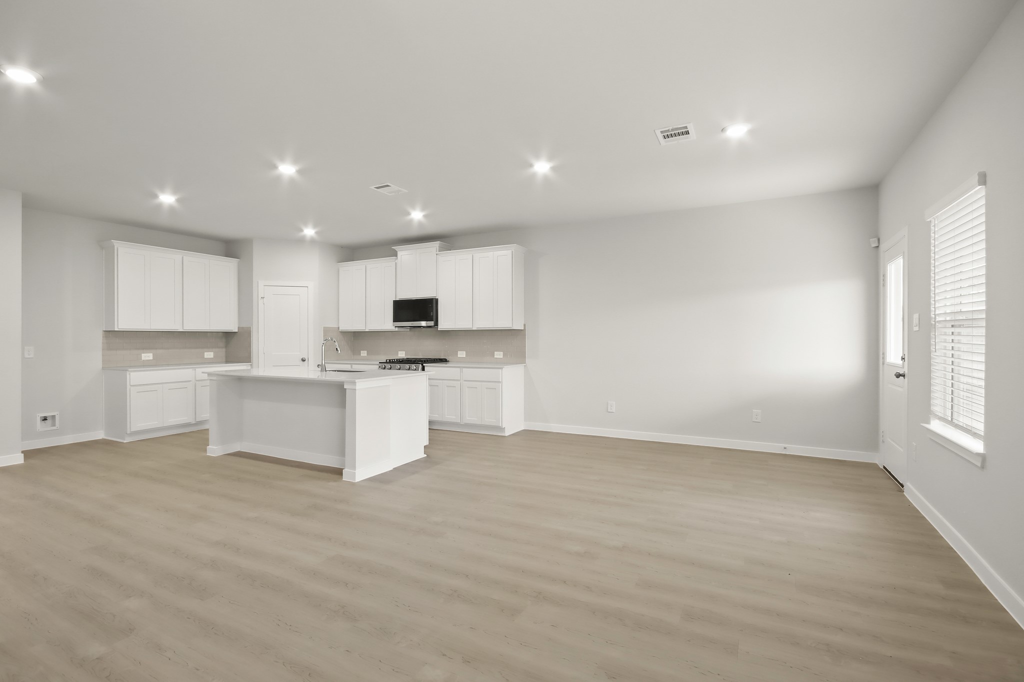 513 Wax Myrtle Way Hockley, TX 77447 - Photo 8 of 29 a view of kitchen with center island wooden floor and center island