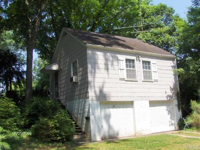 2700 Clark Avenue Raleigh, NC 27607 - Photo 3 of 9 a front view of a house with a yard