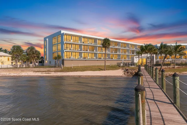 a view of swimming pool with outdoor seating
