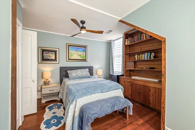 a bedroom with a bed and a closet