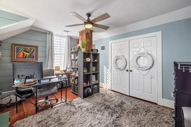 a room with furniture and a fireplace