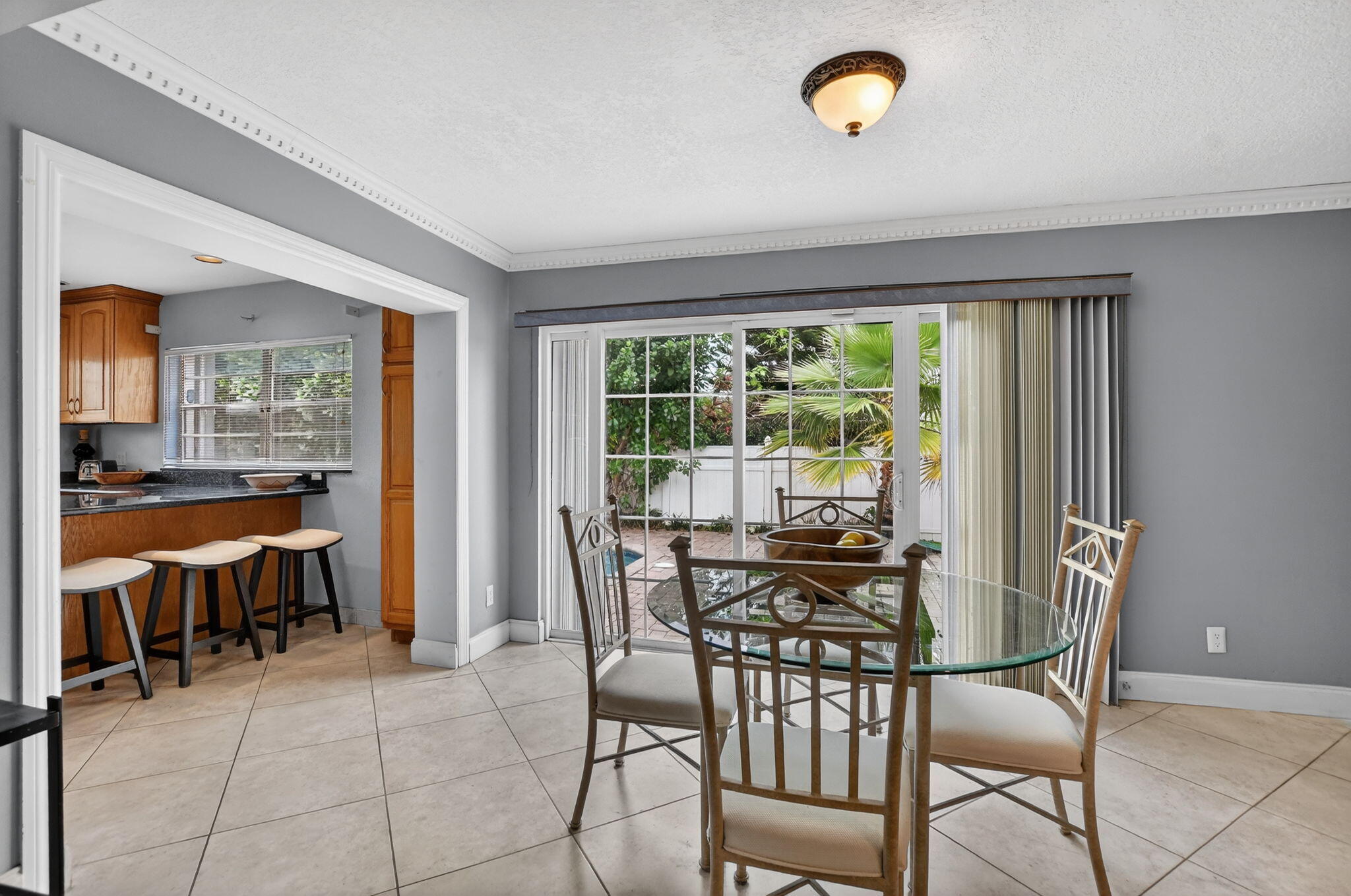 23153 Southwest 60th Way Boca Raton, FL 33428 - Photo 21 of 57 a view of a dining room with furniture window and outside view