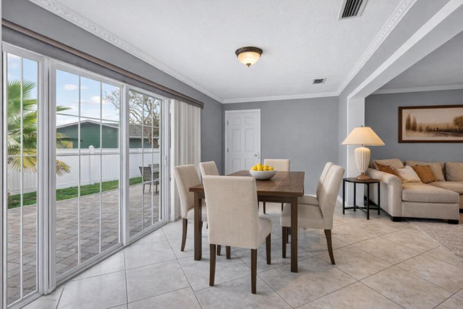 23153 Southwest 60th Way Boca Raton, FL 33428 - Photo 23 of 57 a view of a livingroom with furniture and floor to ceiling window