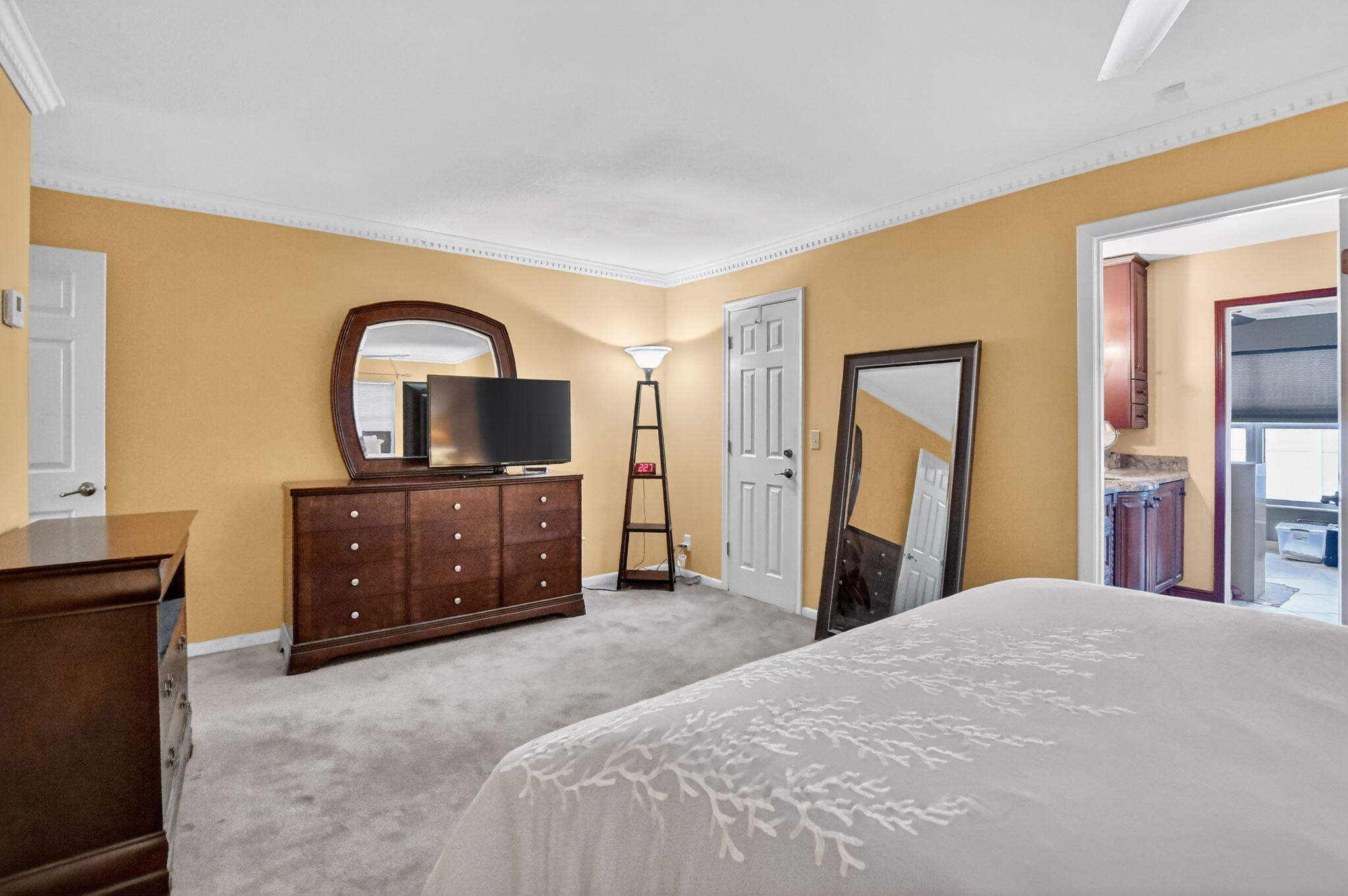 23153 Southwest 60th Way Boca Raton, FL 33428 - Photo 28 of 57 a bedroom with a bed and a television