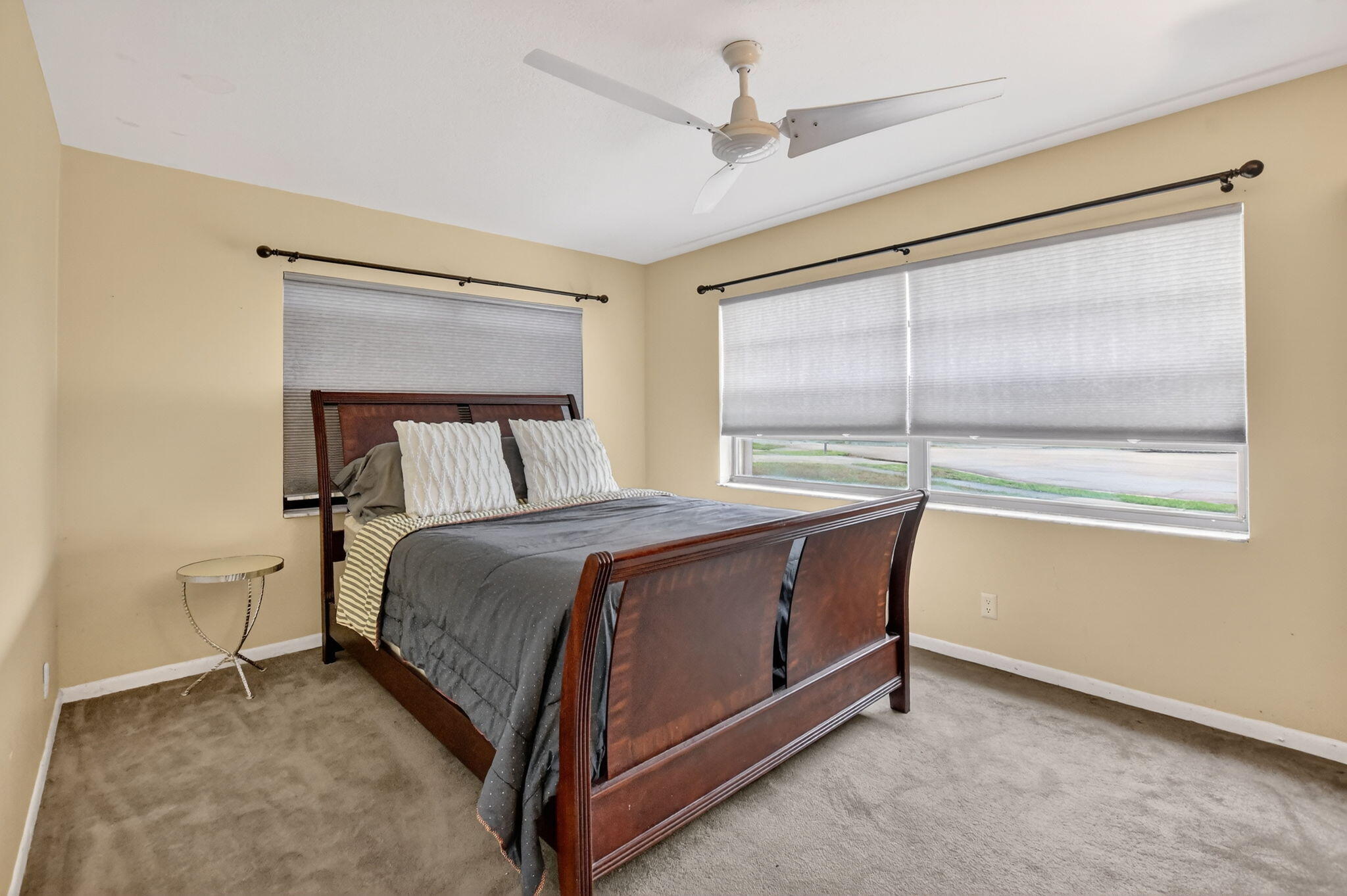 23153 Southwest 60th Way Boca Raton, FL 33428 - Photo 33 of 57 a bedroom with a bed and window