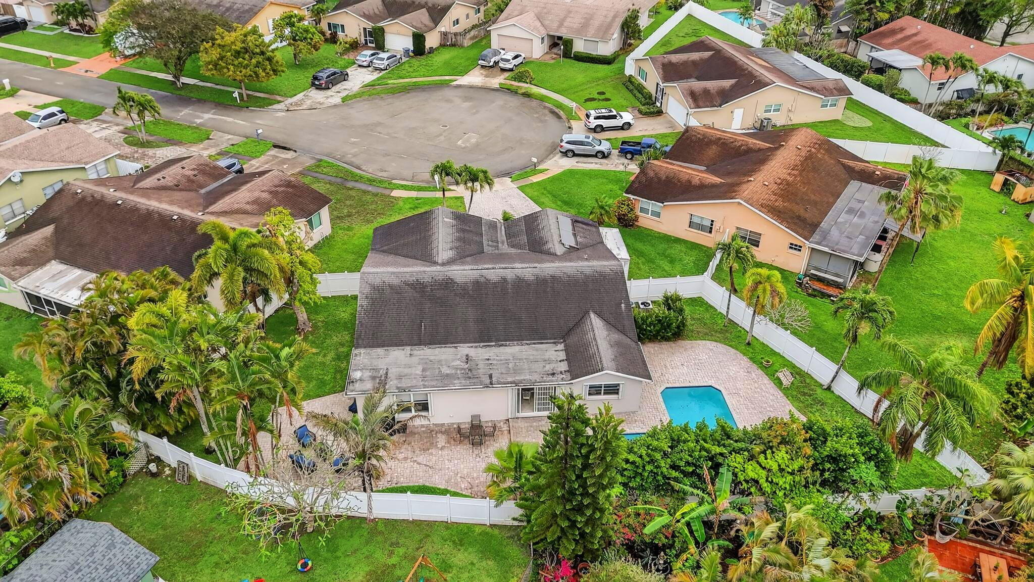 23153 Southwest 60th Way Boca Raton, FL 33428 - Photo 48 of 57 an aerial view of a house with a yard