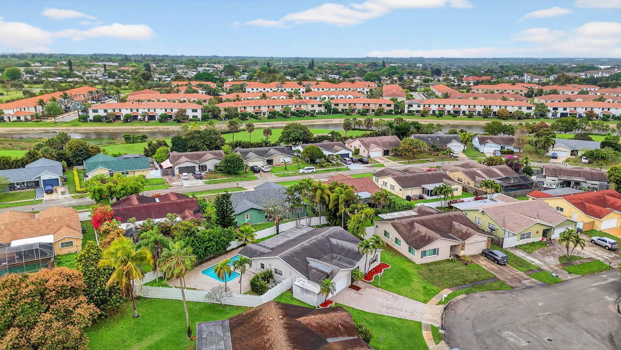 23153 Southwest 60th Way Boca Raton, FL 33428 - Photo 56 of 57 an aerial view of residential houses with outdoor space