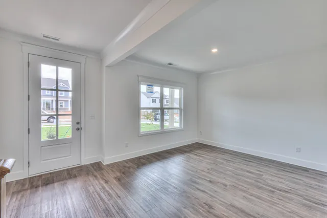 an empty room with windows