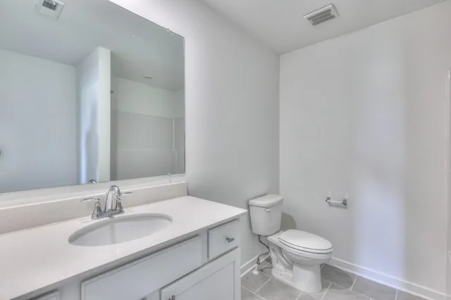 an empty room with closet area