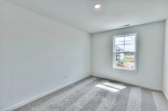 a view of a porch with a garden