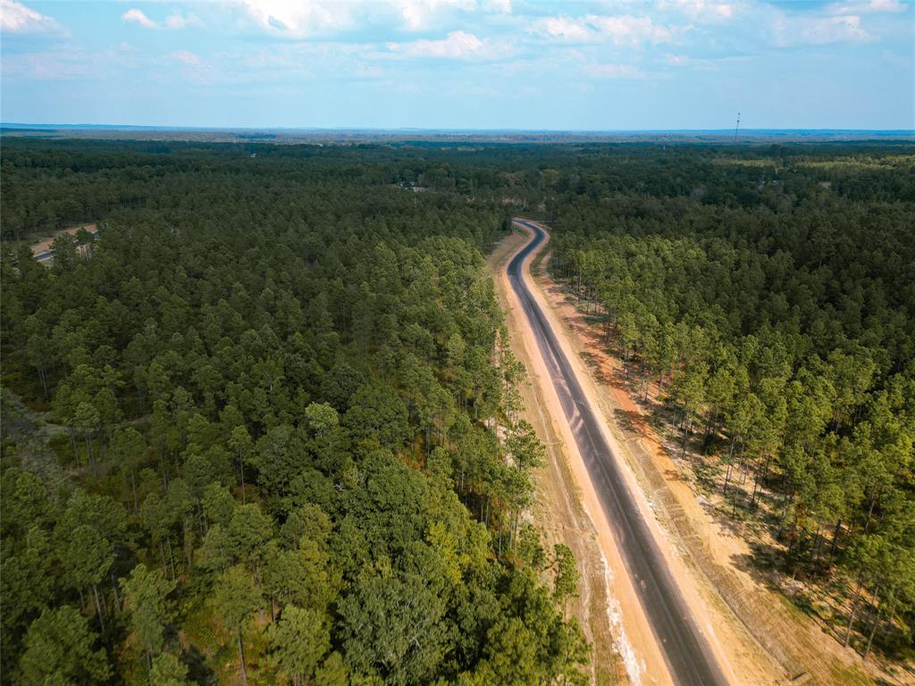 231 Millwood Loop, Unit 16 Minden, LA 71055 - Photo 10 of 18 a view of a lake with a mountain