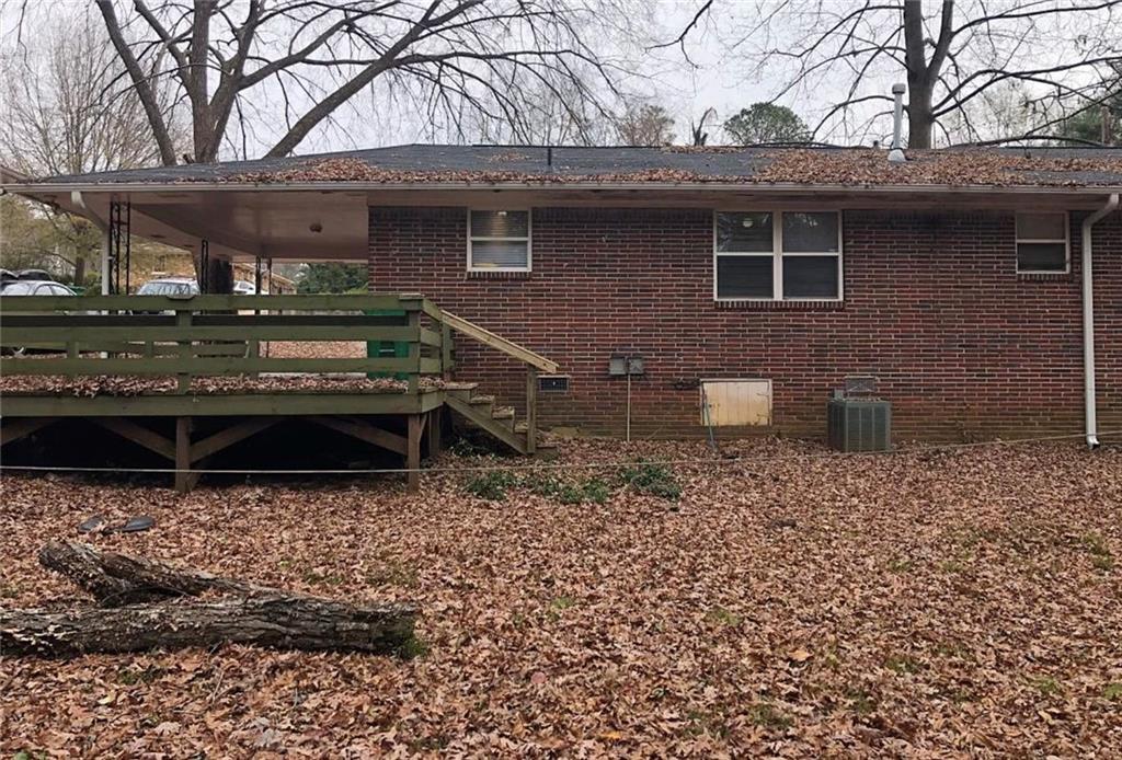 1457 Janmar Drive Decatur, GA 30032 - Photo 9 of 9 a view of a house with a yard and sitting area
