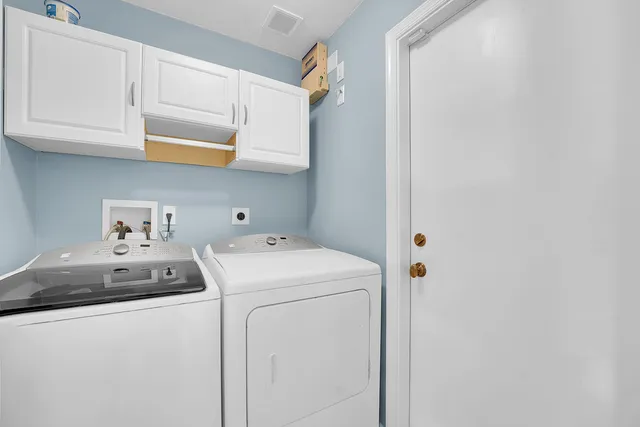 a view of a garden and swimming pool