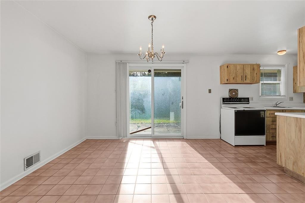 93 Stonesipher Road Oakdale, PA 15071 - Photo 11 of 36 a view of a kitchen with granite countertop a sink and a stove